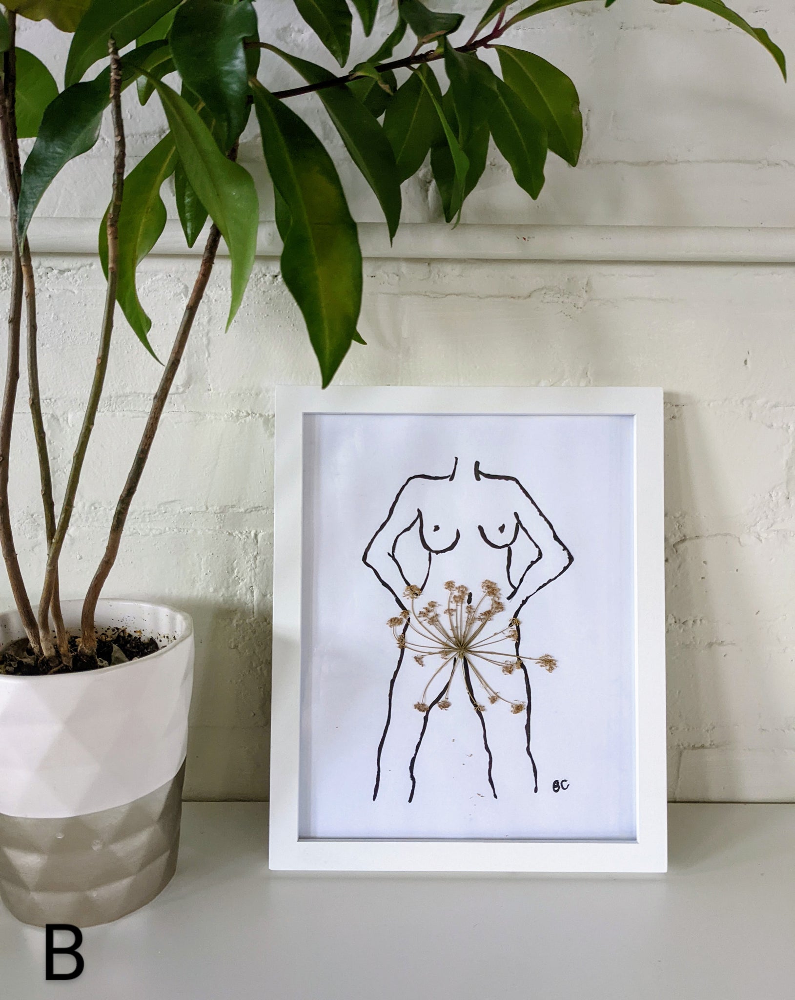 Lady Figure with Pressed Flower Framed Prints